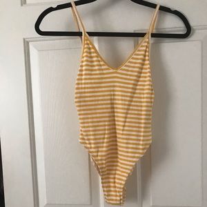 Yellow and white striped tank body suit